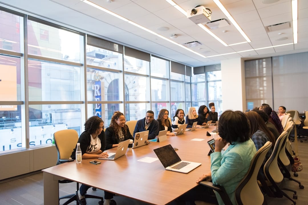  A team in an office discussing email capture during a meeting